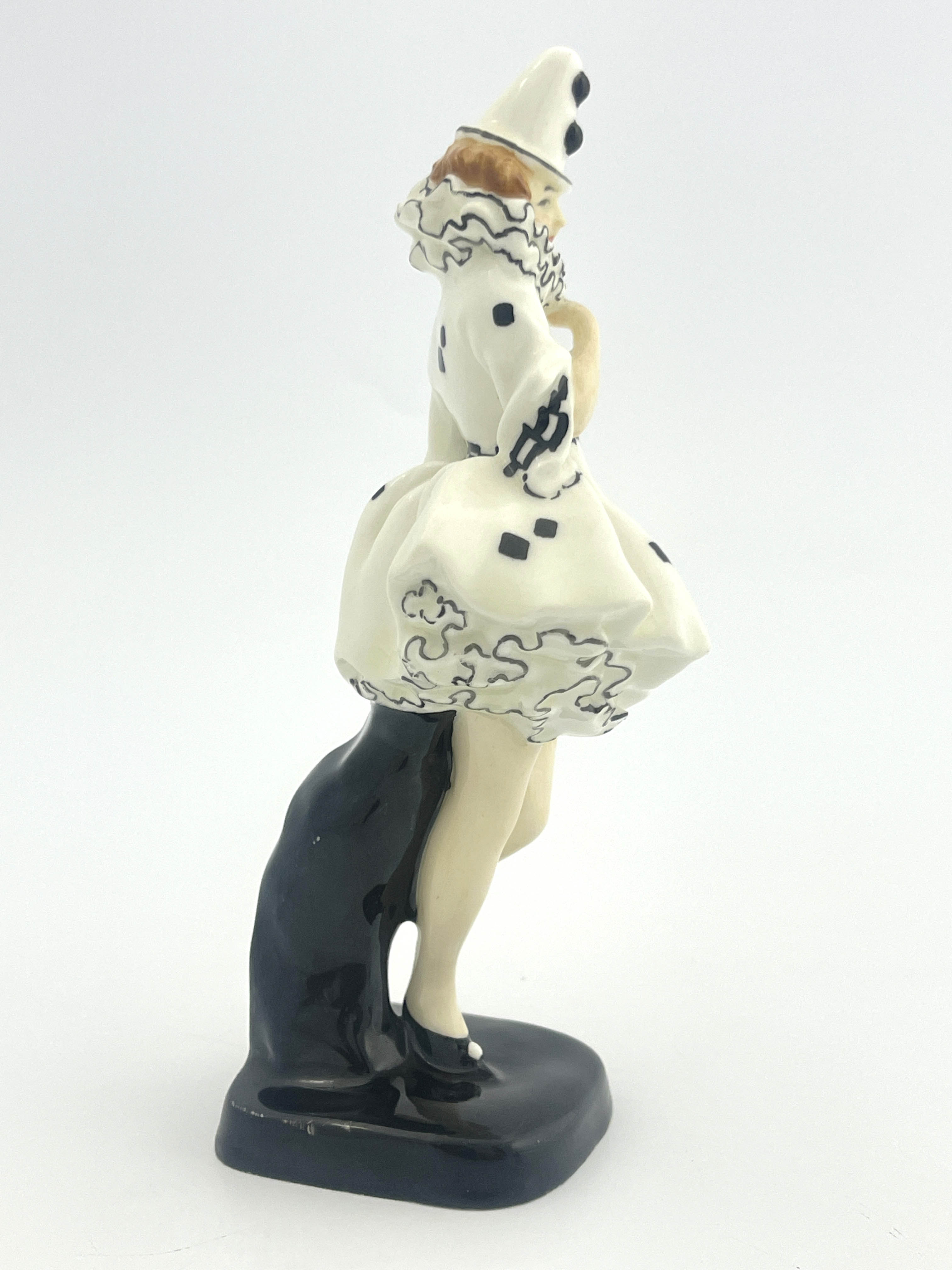 Leslie Harradine for Royal Doulton, a figure, Pierette, HN644, circa 1924, modelled as a clown in - Image 4 of 5