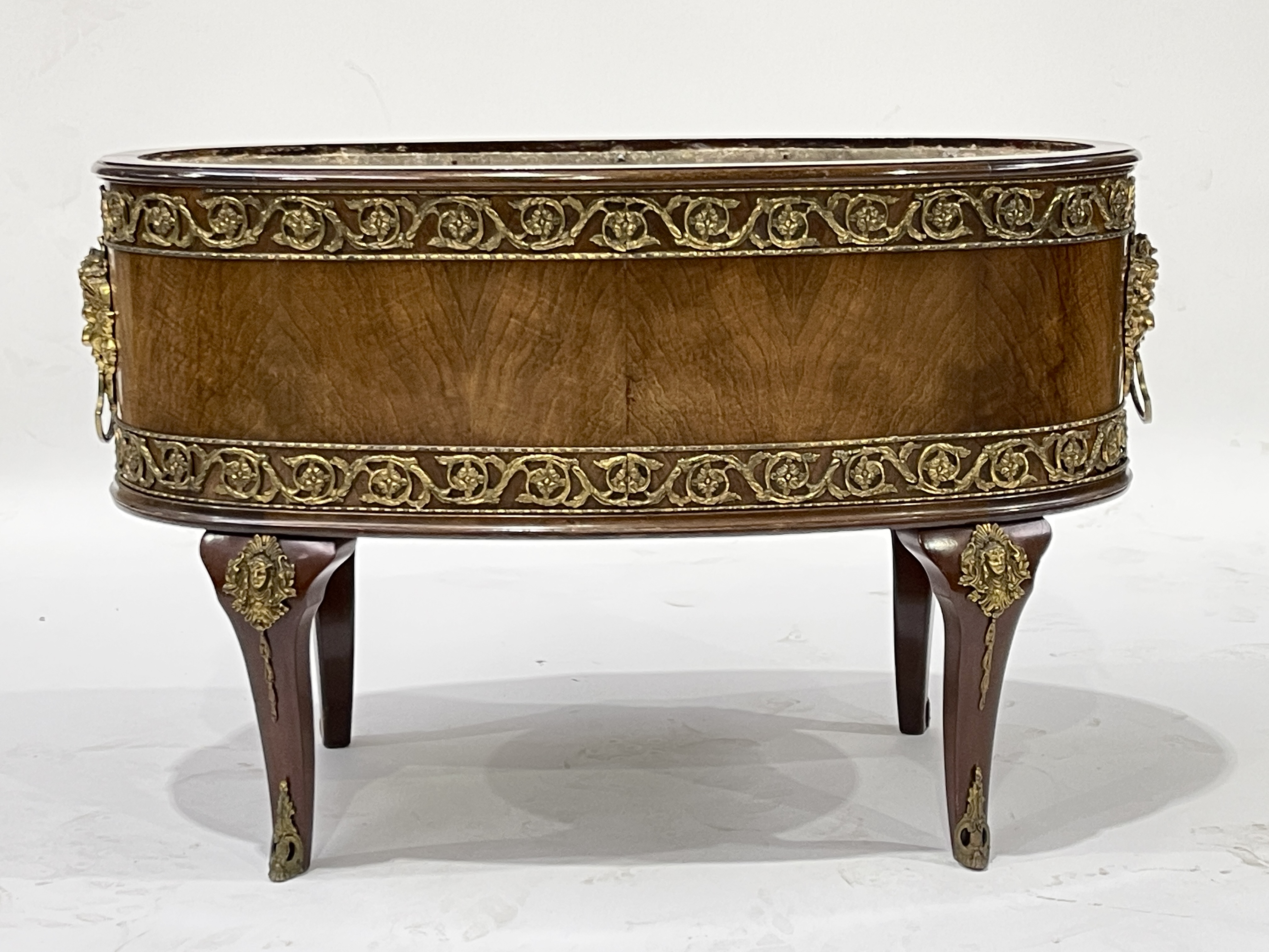 A mahogany wine cooler of Louis XVI design, lead l