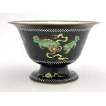 A Wedgwood foo dogs bowl, footed and rounded form with everted rim, printed marks and painted z4734,