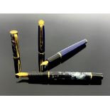 Waterman, a Laureat marbled fountain pen and a Hemisphere fountain pen
