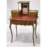 A kingwood bonheur du jour by Gautier et Cie, Paris, marquetry inlaid and strung, raised back with