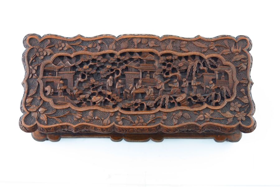 A late 19th Century Cantonese wooden table casket, carved throughout with figures and pagodas in - Image 2 of 4