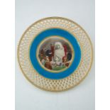 A 19th Century Minton cabinet plate, painted with a roundel of the 1840 painting Trial by Jury after