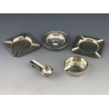 Silver smoking requisites, to include a pair of George V silver square ashtrays, A.E. Poston & Co