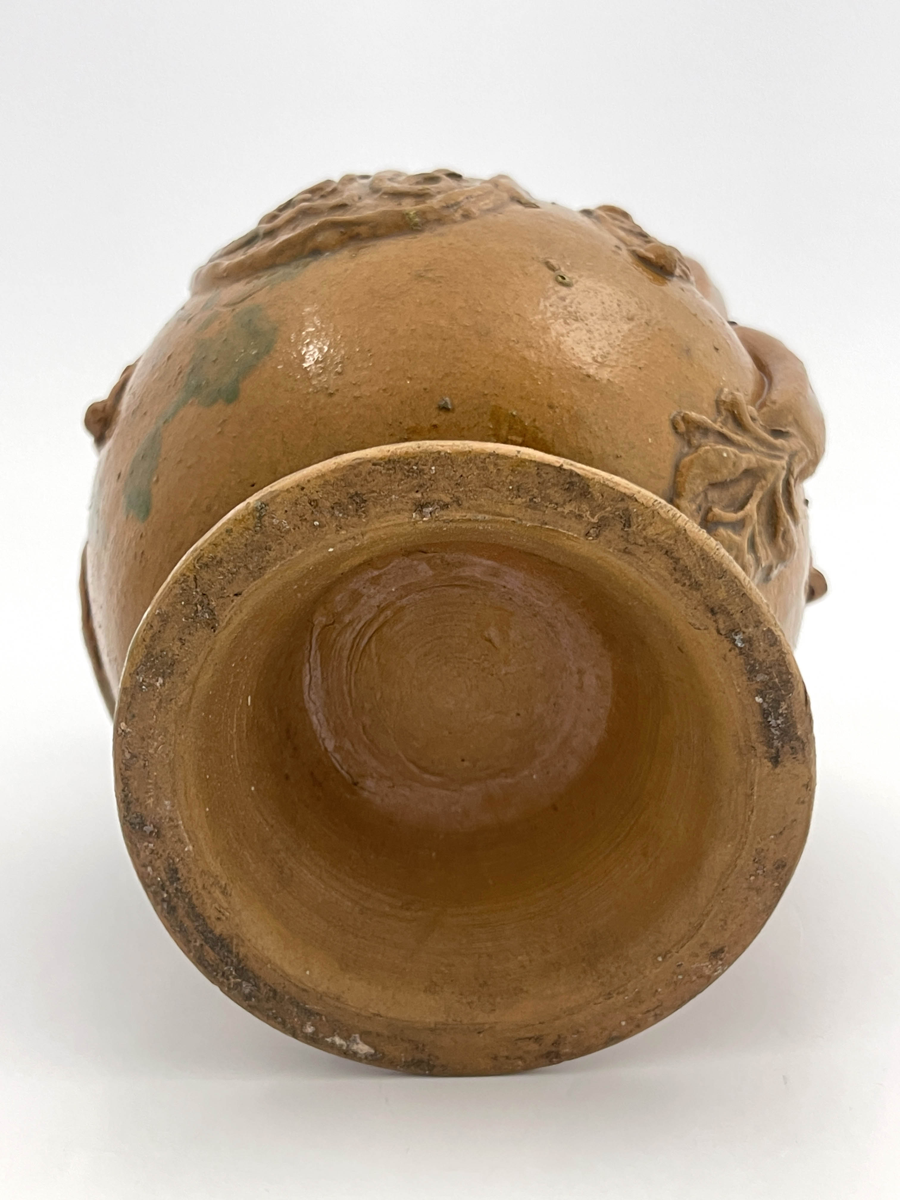 An Islamic stoneware ewer, of ovoid form with handle, sprigged medallions of Islamic script and - Image 3 of 5