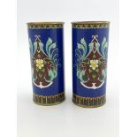 A pair of oriental cloisonne sleeve vases, decorated with stylised exotic birds amongst foliage on a