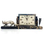 Georges Lavroff, an Art Deco desk clock and pen stand, with cast silvered bronze figure modelled