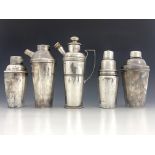 A group of Art Deco silver plated cocktail shakers, to include a Universal cocktail shaker by