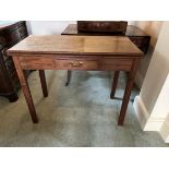 A George III mahogany games table, circa 1800, rectangular fold-over top, single frieze drawer,