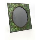 Tiffany Studios, an American Art Nouveau bronze and stained glass photo frame