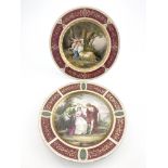 A pair of late 19th Century Vienna porcelain circular plates, painted classical scenes, courting