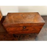 A George III rosewood tea caddy, circa 1810, of rectangular form, the hinged cover opening to a