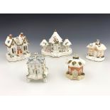 Five 19th Century pastille burners, to include a triple group of Regency Gothic villas, possibly