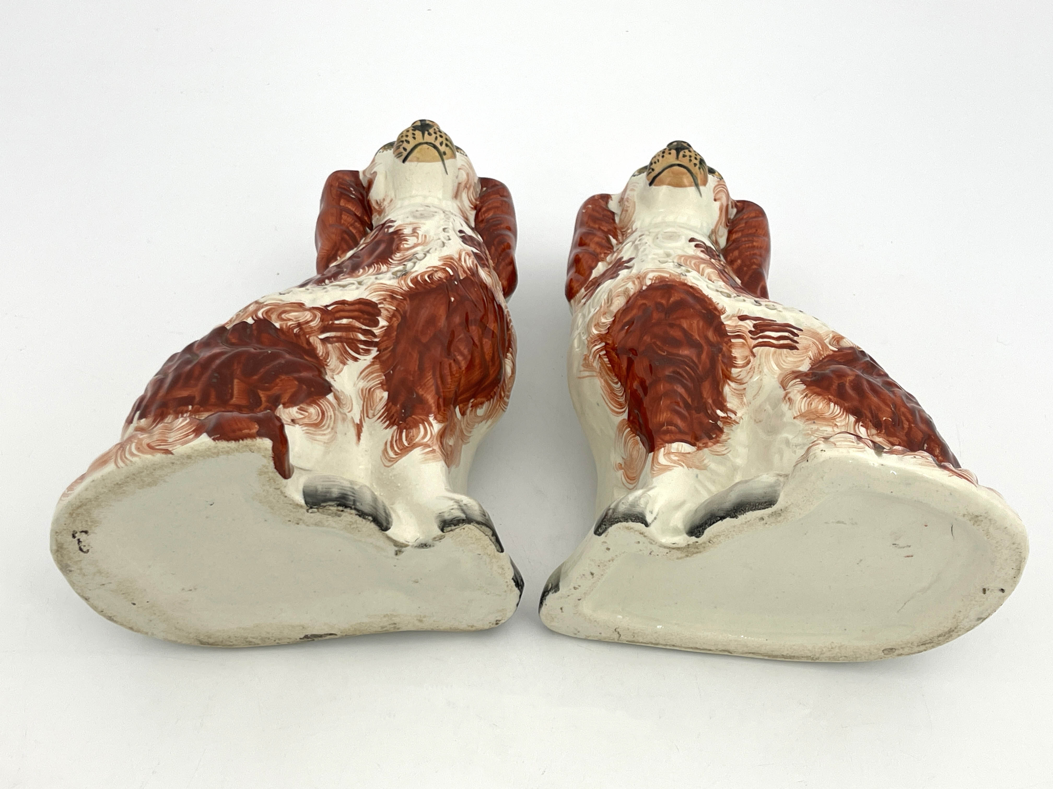 A pair of 19th Century Staffordshire flatback chimney dogs, modelled as brown and white spaniels, - Image 5 of 5