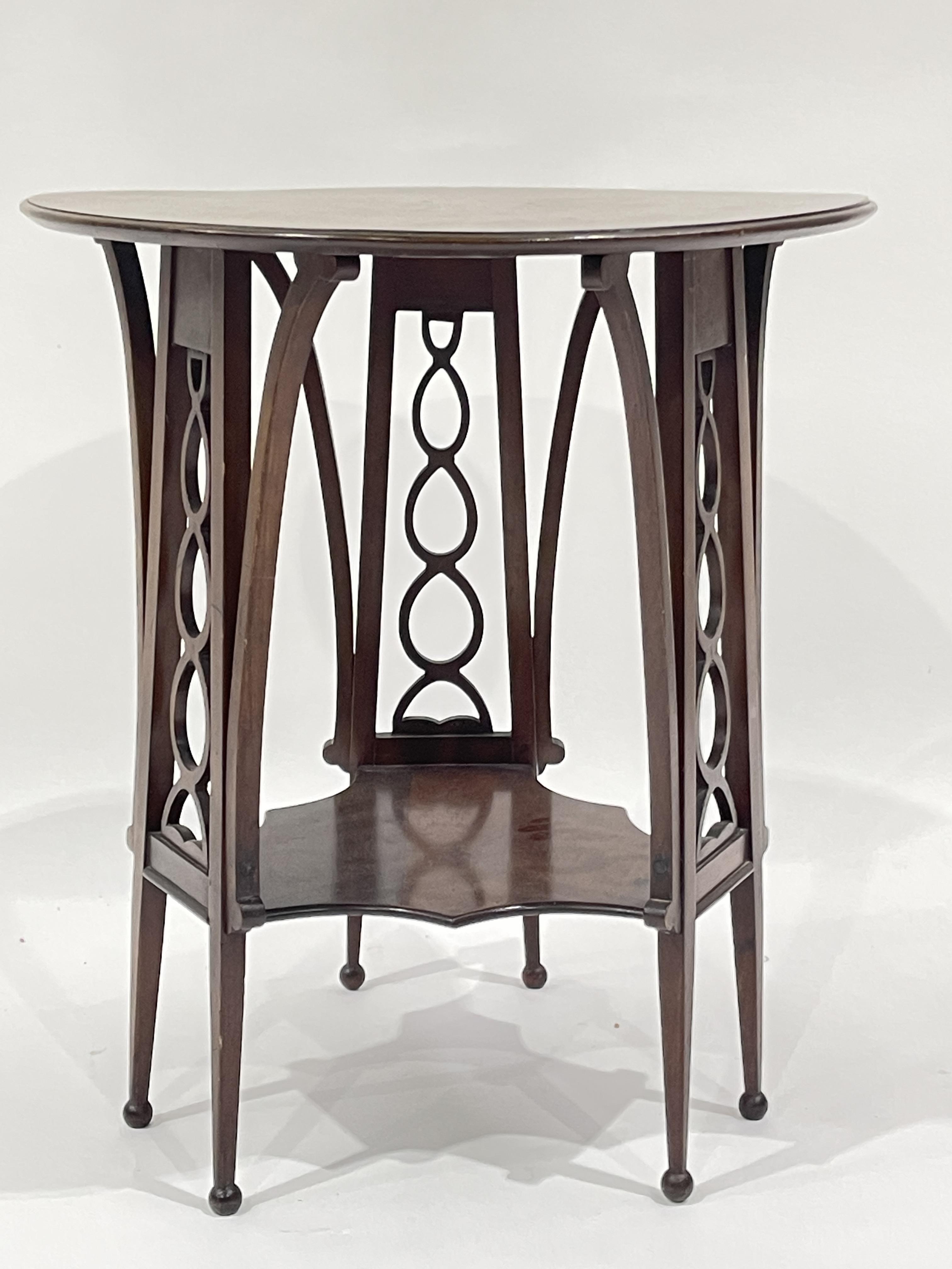 An Edwardian mahogany Art Nouveau occasional table, circa 1905, circular marquetry inlaid top, - Image 2 of 3