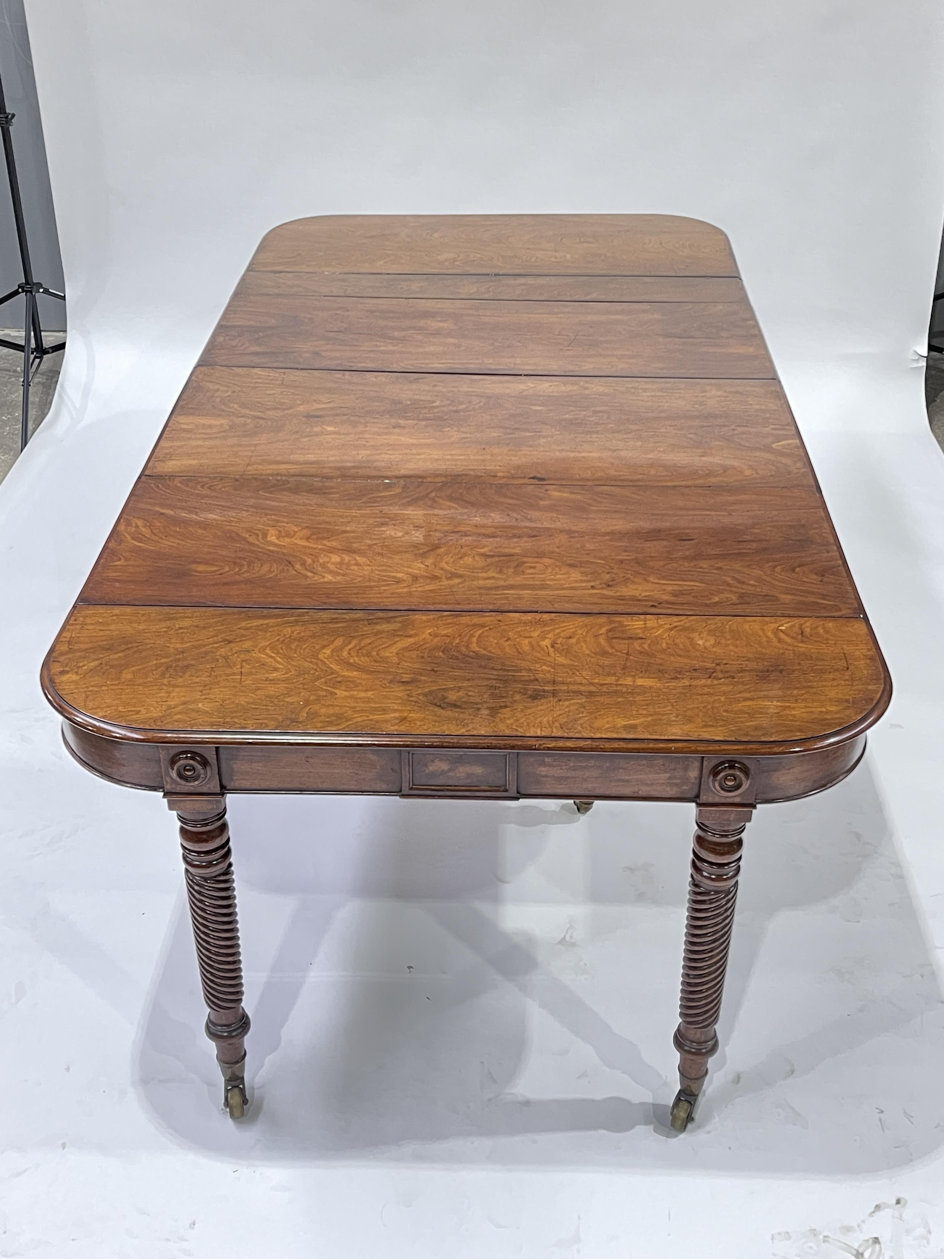 A George III mahogany metamorphic D-end dining table, circa 1810, with three additional leaves, - Image 3 of 3