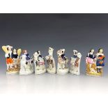 A group of seven 19th Century Staffordshire flatback figure groups, to include four figures of