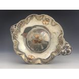 A French Aesthetic Movement silver and gold overlay dish, Cardeilhac