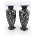 George Tinworth for Royal Doulton, a pair of stoneware vases