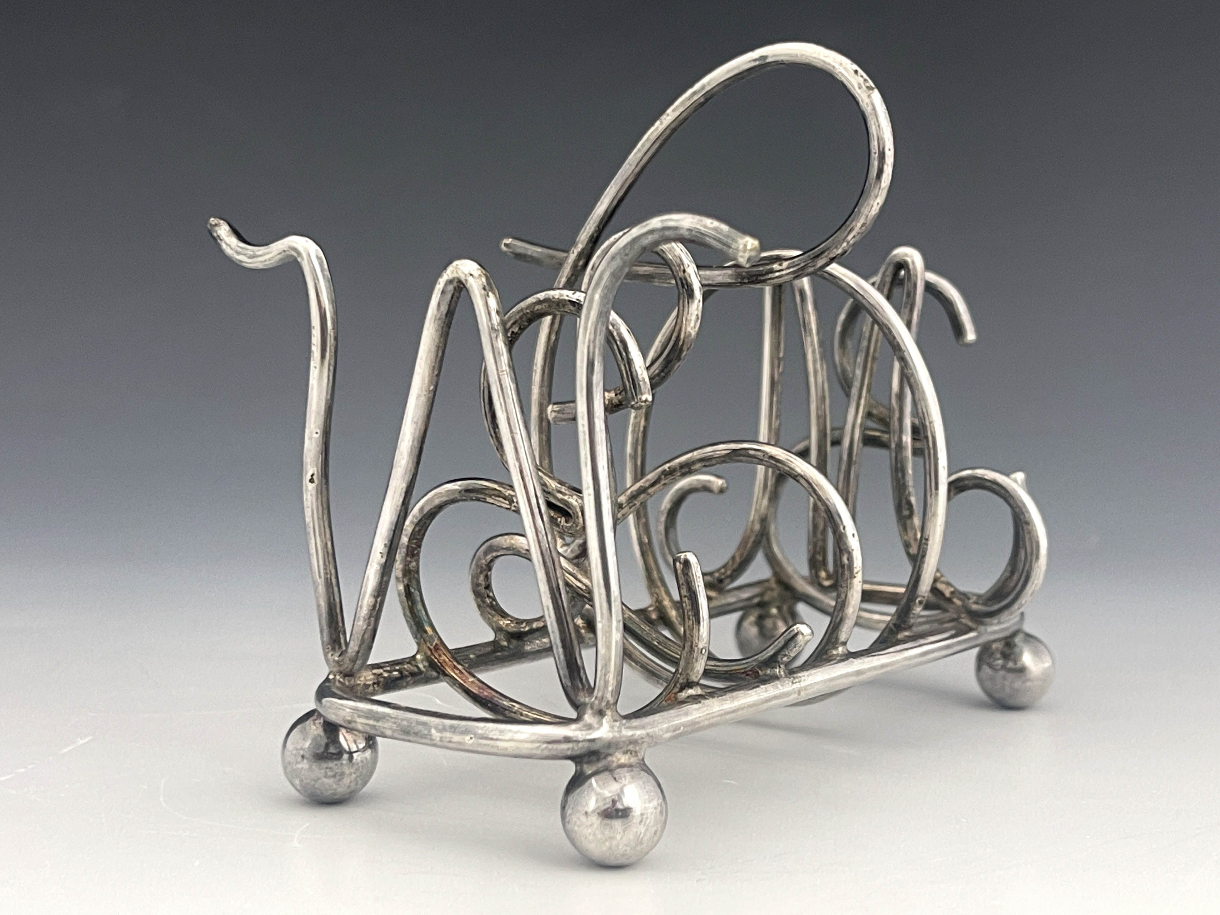 A Victorian silver plated novelty toast rack