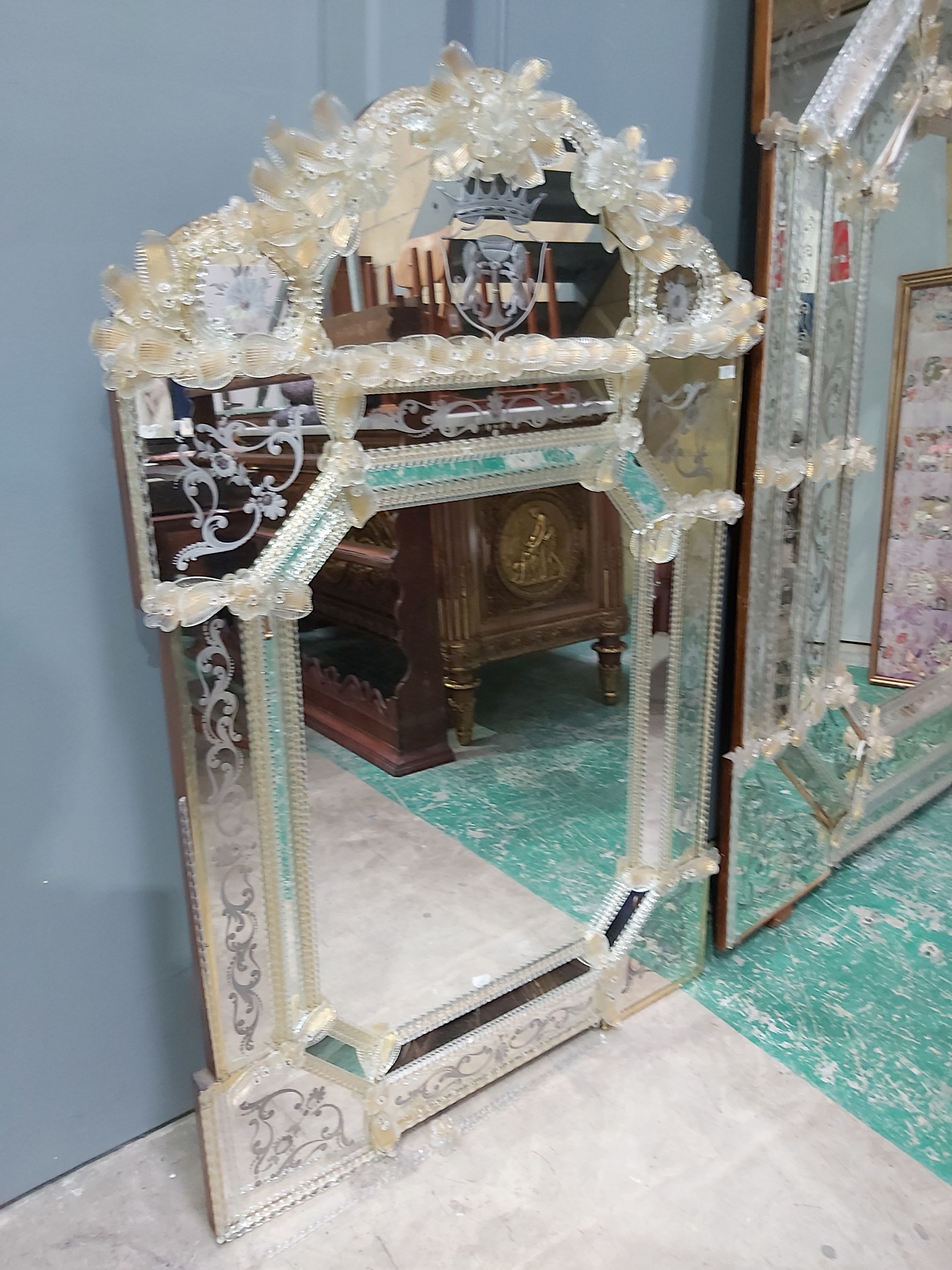 A Venetian design wall mirror, 20th Century, gilt pincered glass embellishments throughout, arched