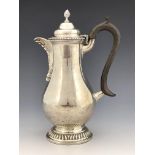 An Edwardian silver hot water jug, Charles Stuart Harris, London 1904