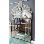 A large Venetian design wall mirror, 20th Century, gilt pincered glass floral embellishments