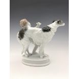 Max Hermann Fritz for Rosenthal, a porcelain figure of a putto with dog