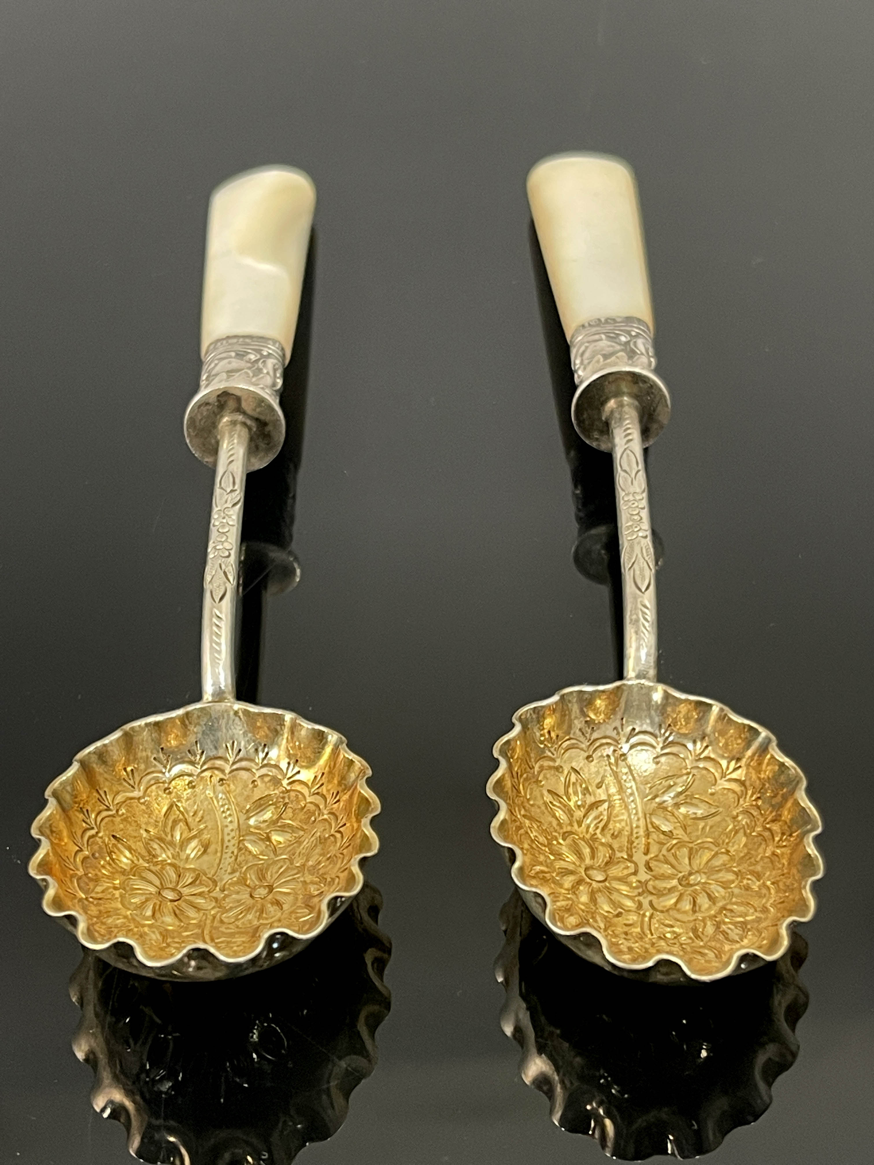 A pair of Victorian silver gilt and mother of pearl fruit spoons, Lee and Wigfull, Sheffield 1897 - Image 2 of 4