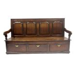A George III country oak box settle, circa 1760, mahogany crossbanded fielded panelled back,