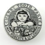 A 19th century advertising pot lid, Cherry Toothpaste, May Roberts & Co London, monochrome