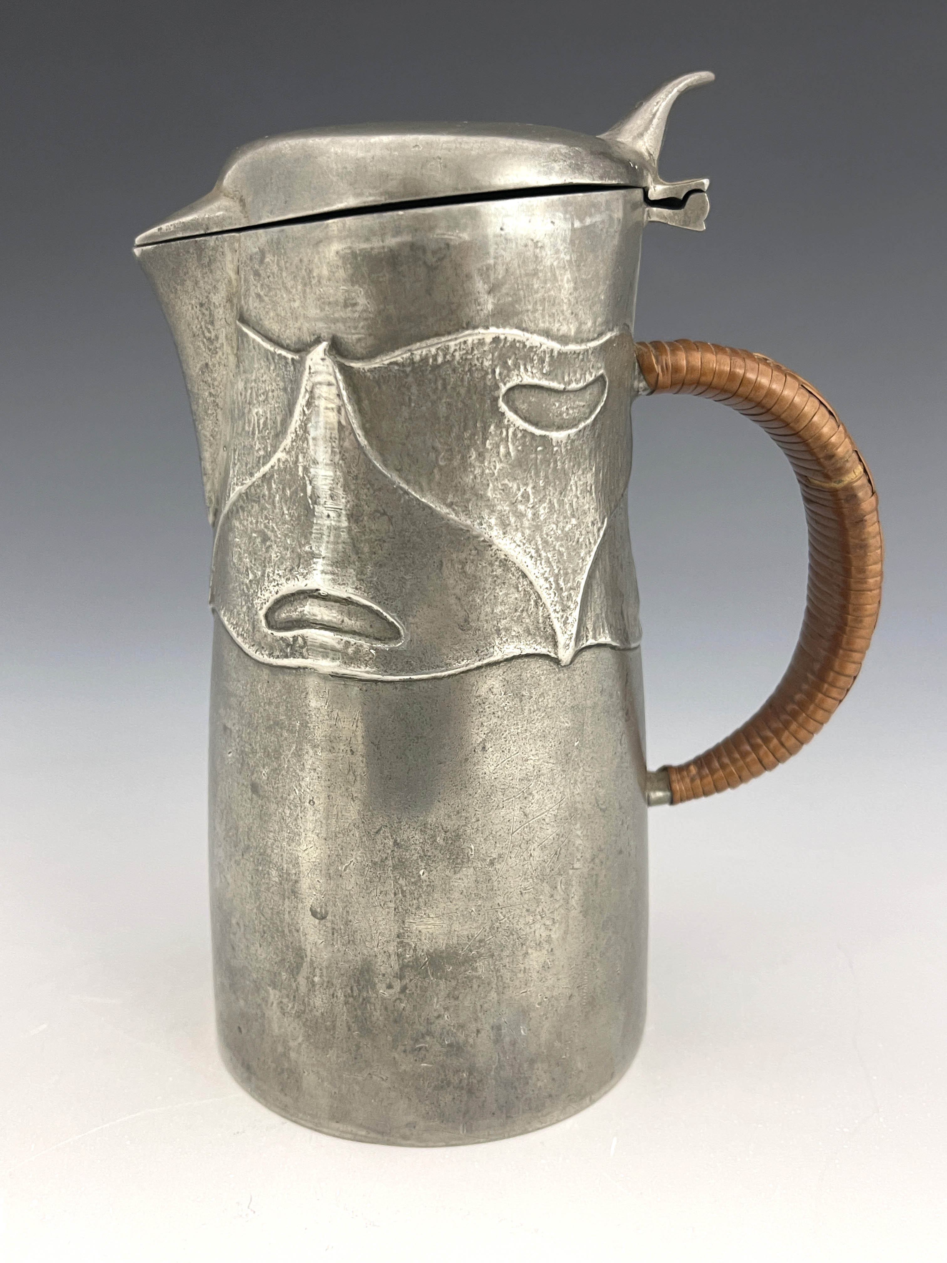 Archibald Knox for Liberty and Co., an Arts and Crafts Tudric pewter jug