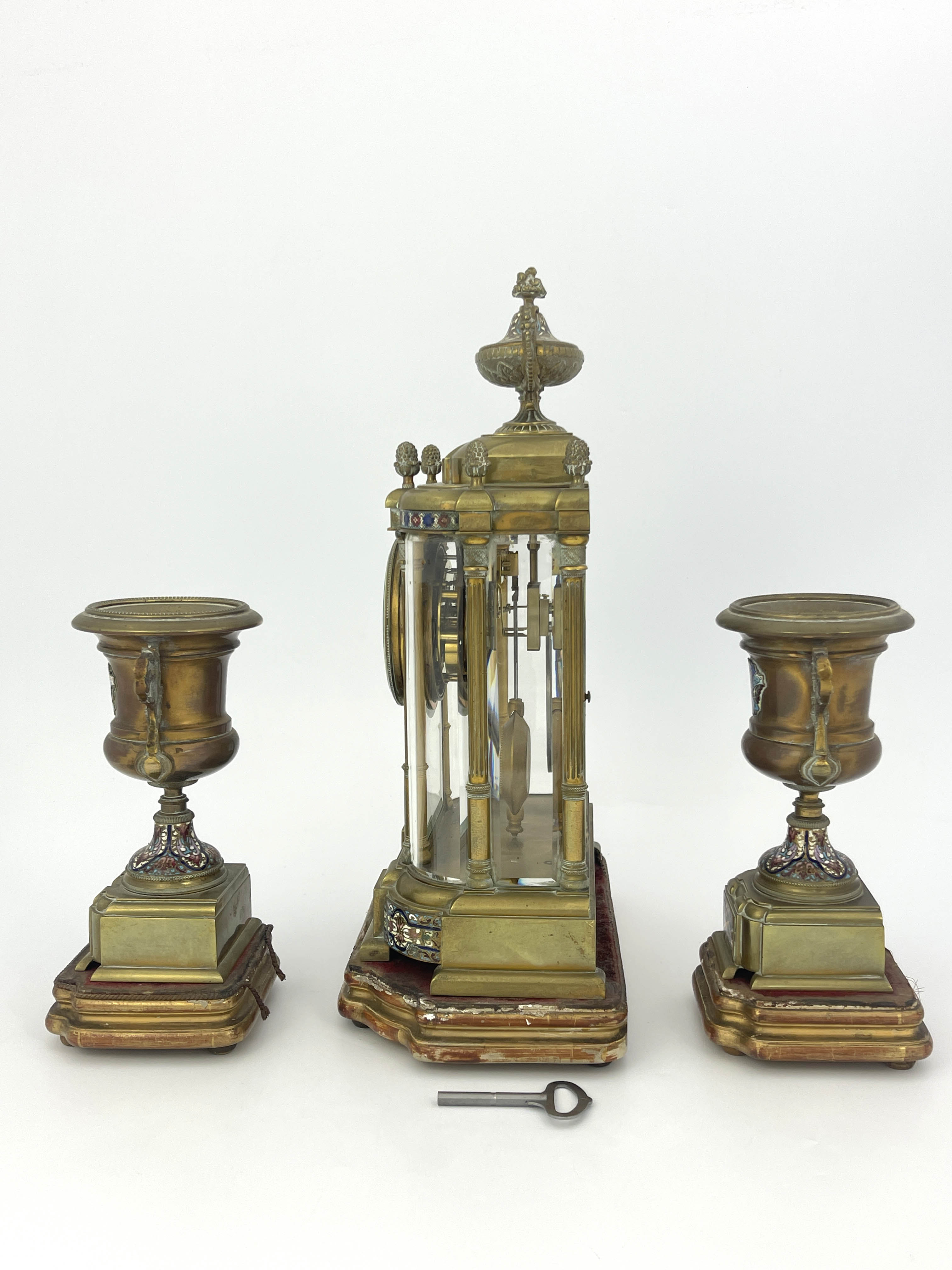 A French brass clock garniture, circa 1870, the breakfront case of Baroque architectural form with - Image 2 of 2