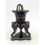 Christopher Dresser for Minton, an Aesthetic Movement figural vase,