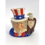 A Royal Doulton prototype flask or character jug, Uncle Sam, modelled with eagle handle with gilt