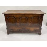 A George III country oak mule chest, circa 1770, moulded hinged top, inner side till drawers and