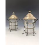 A pair of Arts and Crafts silver plated glass lanterns