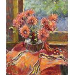 Edward Noott (British, 1963), still life of orange Chrysanthemum in a glass vase on a patterned