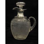 An Edwardian silver mounted glass whisky flagon, William Comyns, London 1906