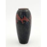 A Japanese Kutani vase, shouldered form, dripping red glaze painted mountain scene, painted marks,