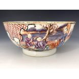 A Chinese famille rose bowl, late 18th Century, the frieze decorated with cartouche panels of