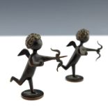 Karl Hagenauer, a pair of Austrian bronze figures, circa 1930, modelled as Cupids, stamped marks,