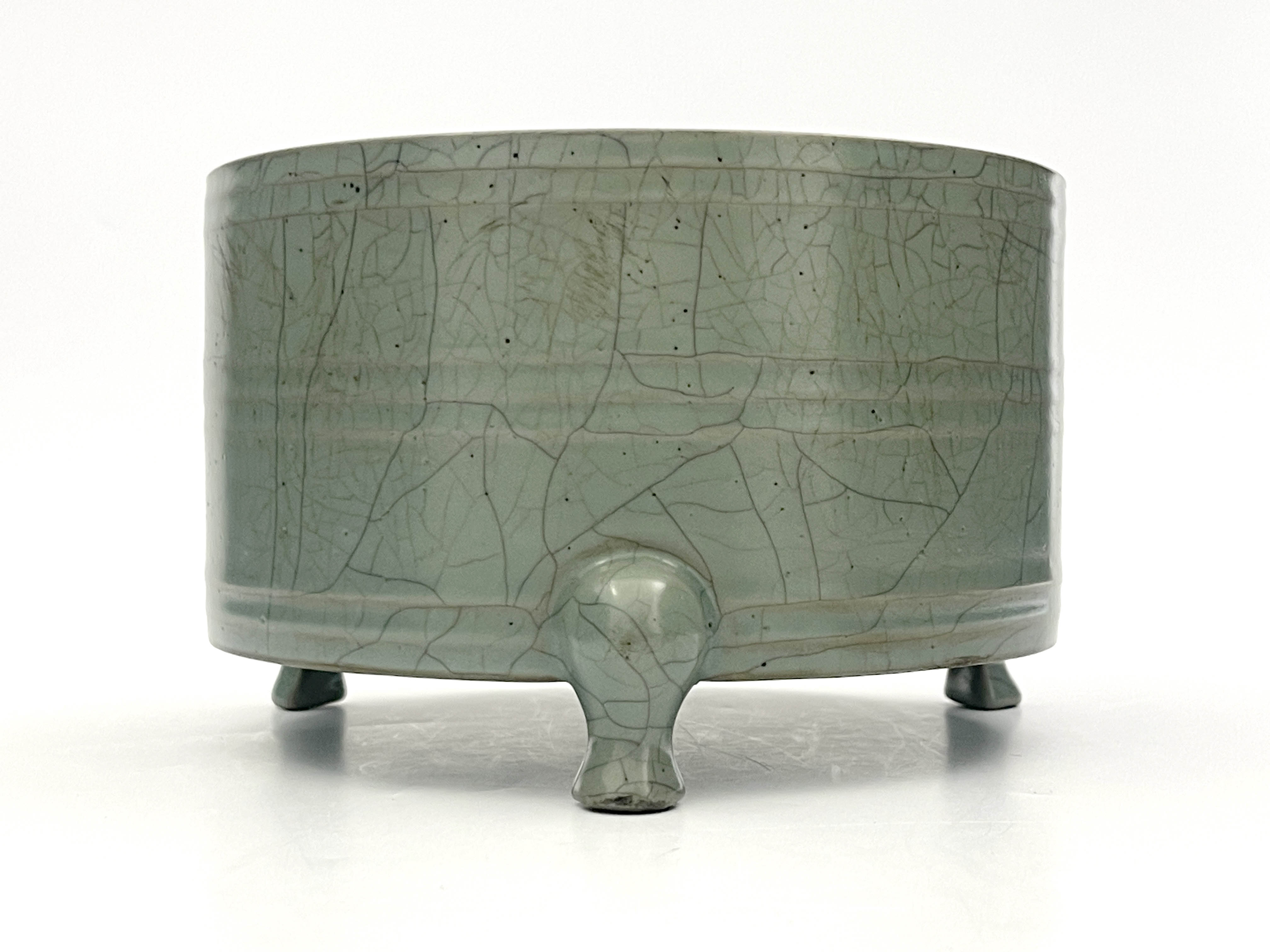 A Chinese Sung type jardiniere, 19th Century or later, of cylinder form on triple feet, olive - Image 2 of 4