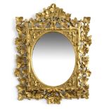 A 19th Century wall mirror, oval beveled plate, ca