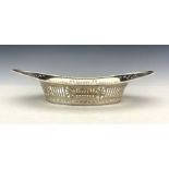 A George V silver fretwork bowl, Barker Brothers, Chester 1917, pierced boat form, reeded and