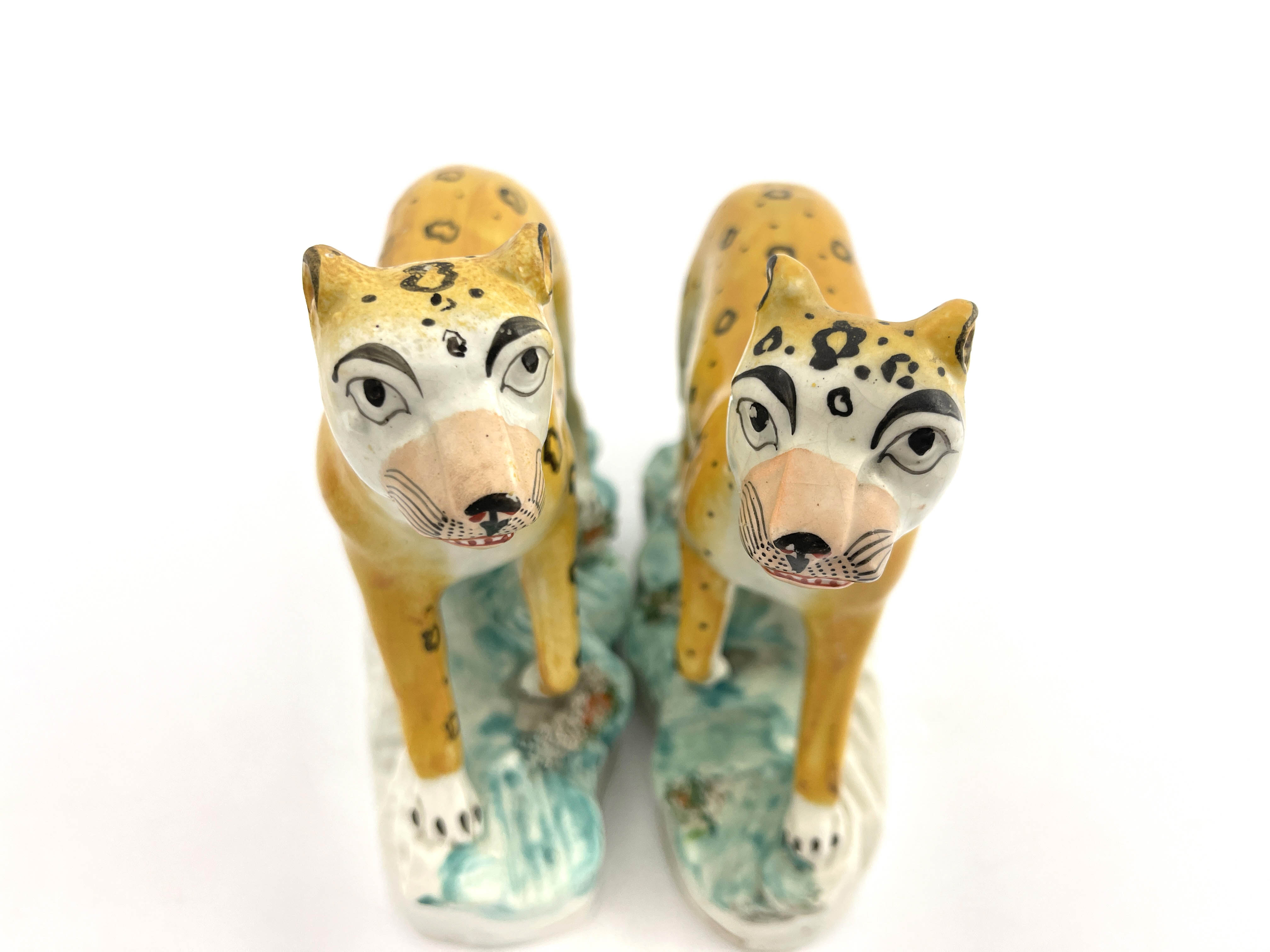 A rare pair of 19th Century Staffordshire pottery leopards, modelled strolling and decorated in - Image 6 of 7