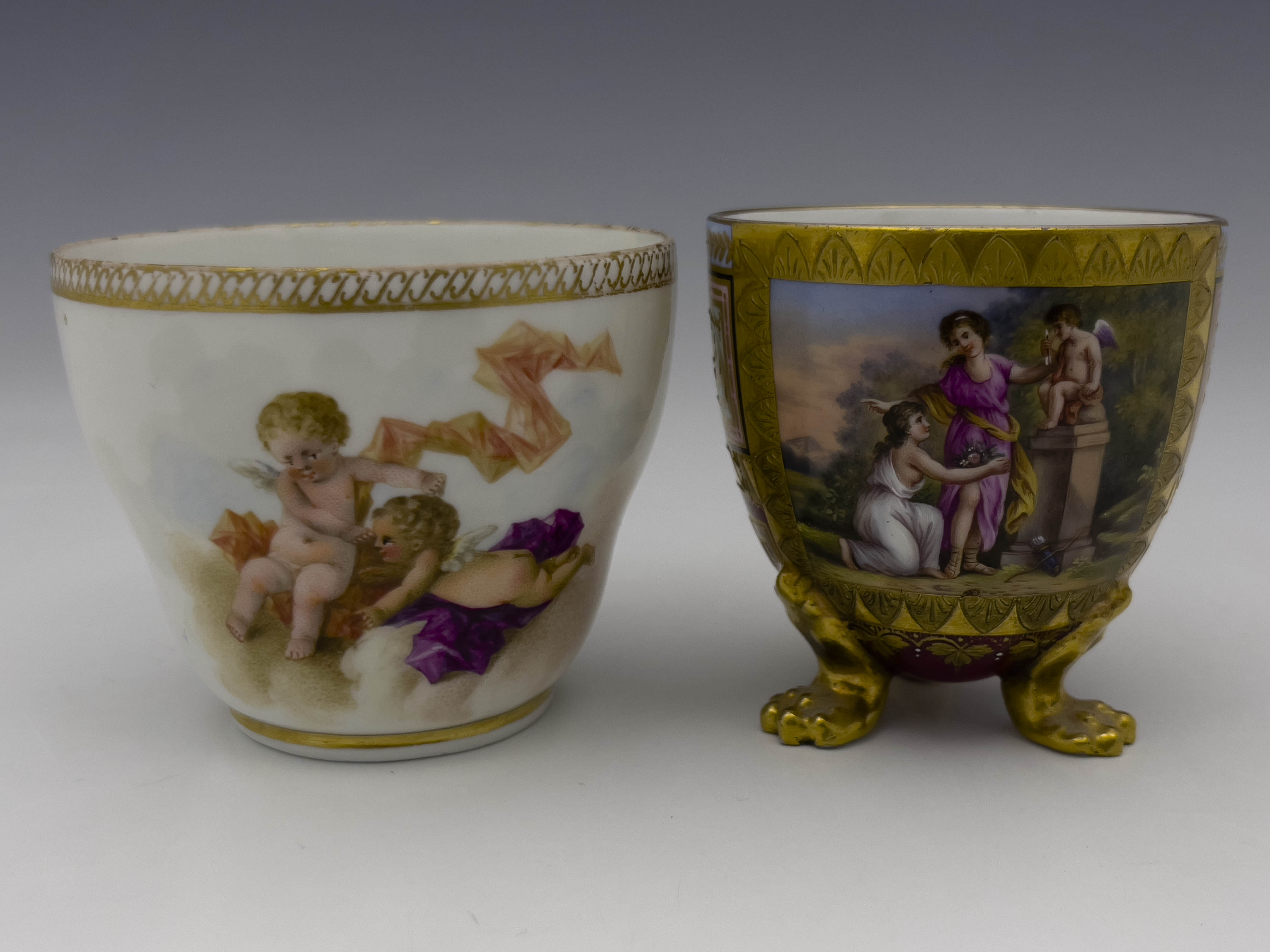 A Meissen painted cabinet cup and a Vienna cup