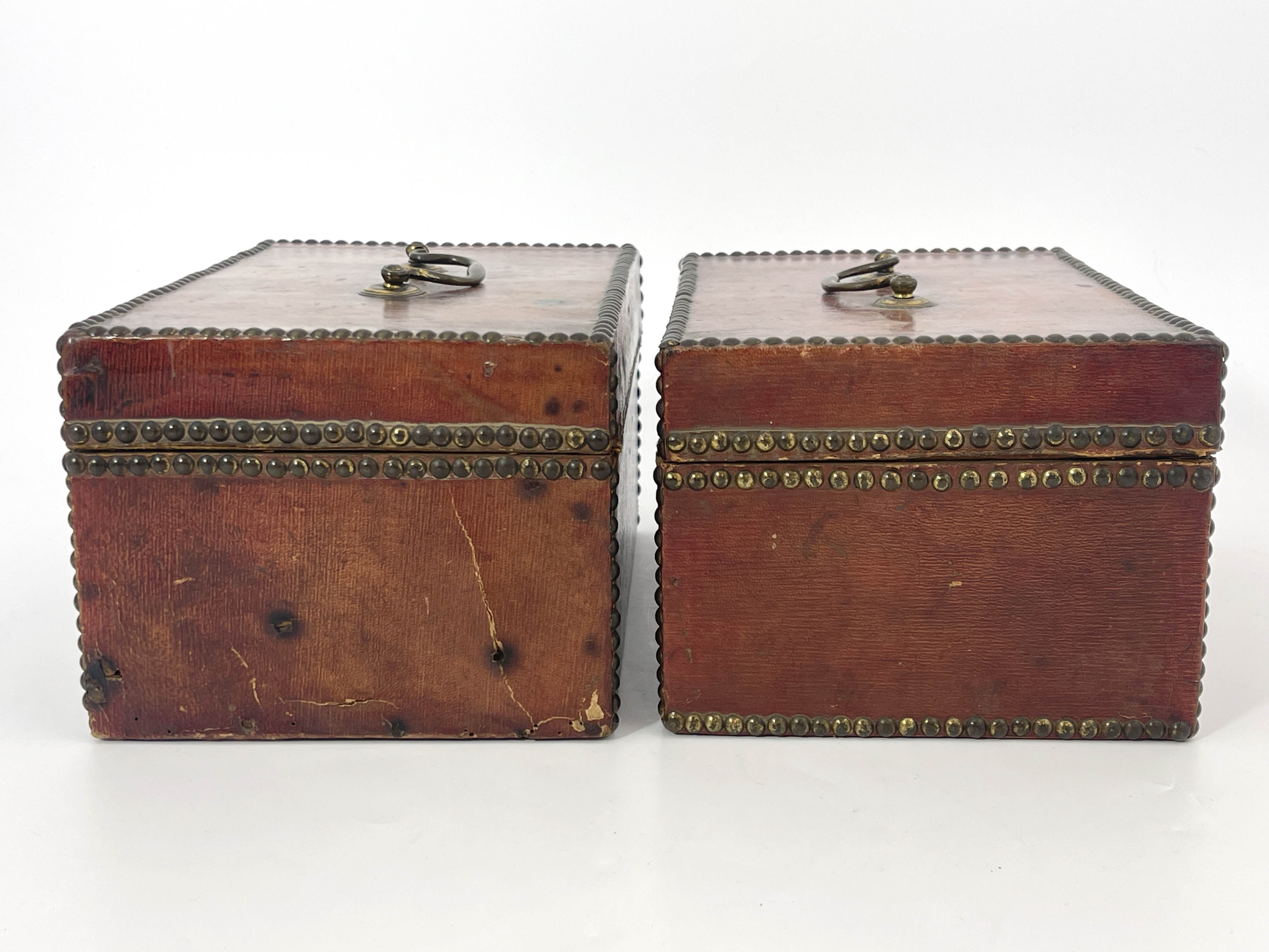 A pair of George III deed boxes, morocco bound with brass studded borders, swing handles to the ring - Image 4 of 4