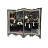 A Chinese black laquered four fold screen, with applied hardstone and jadeite figures and floral