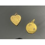 Two Art Nouveau gold pendant lockets